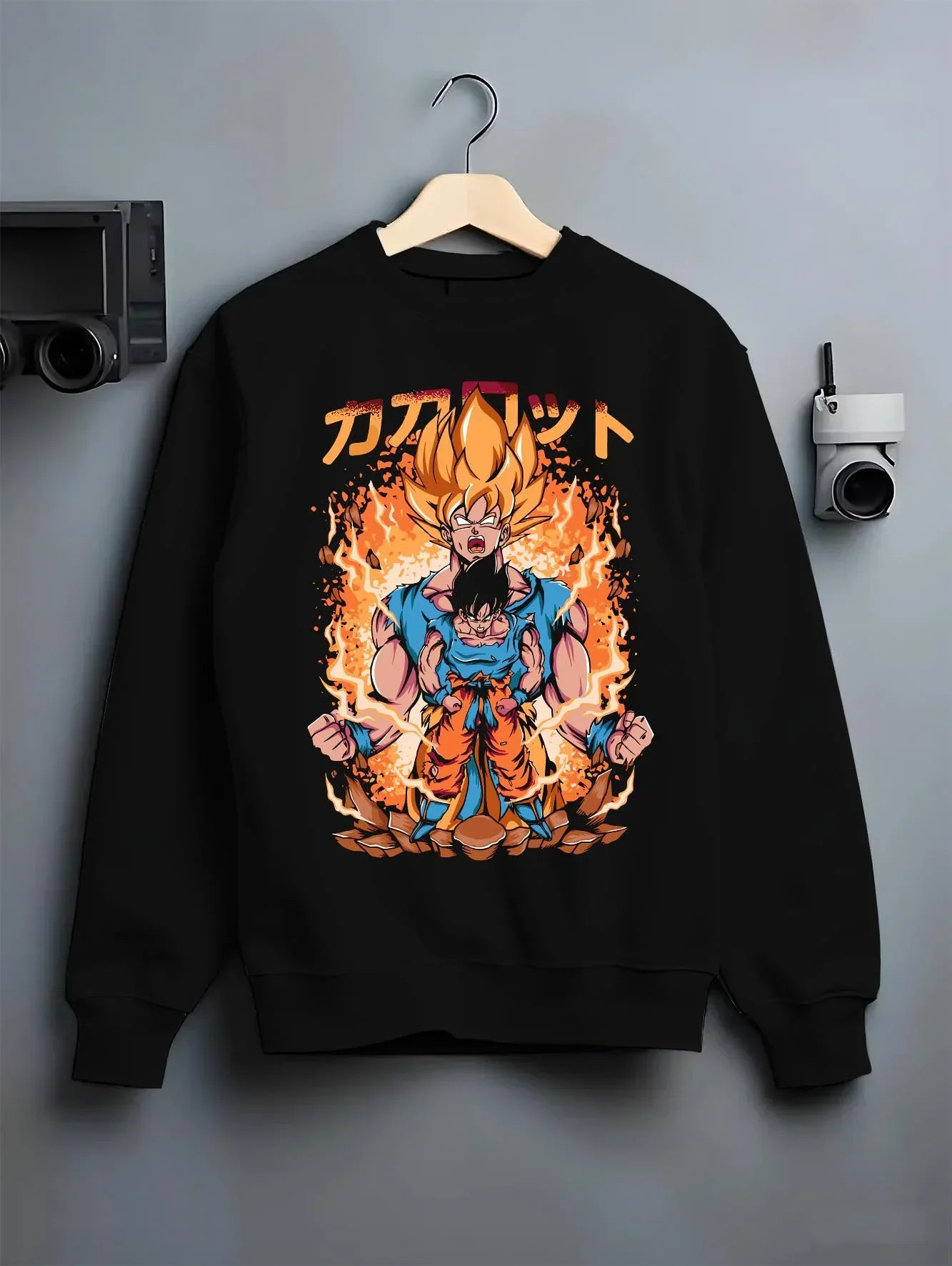 Black crewneck sweatshirt on hanger with Goku Hoodie Dragon Ball Z Super Saiyan Form Burst graphic bold anime graphic.