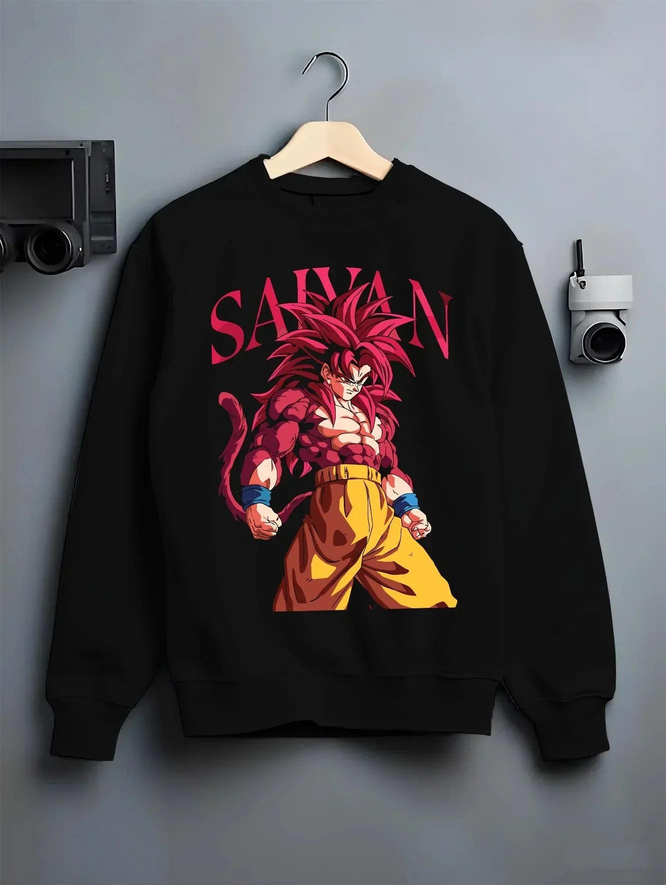 Black crewneck sweatshirt on hanger with Dragon Ball Z Hoodie Goku Super Saiyan 4 Jumper graphic premium wear.