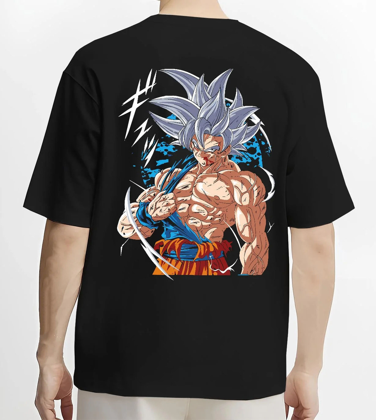 Black T-shirt worn by male model from the back featuring Goku mastered Ultra Instinct artwork.