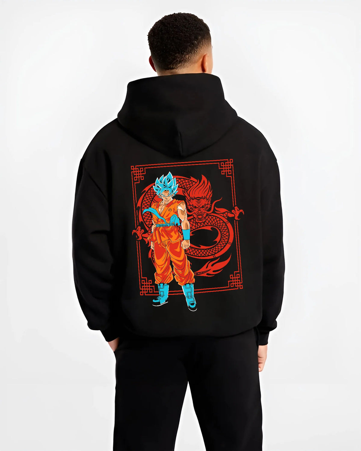 Black hoodie model back view showing Goku from Dragon Ball: Super Saiyan Blue with dragon graphic
