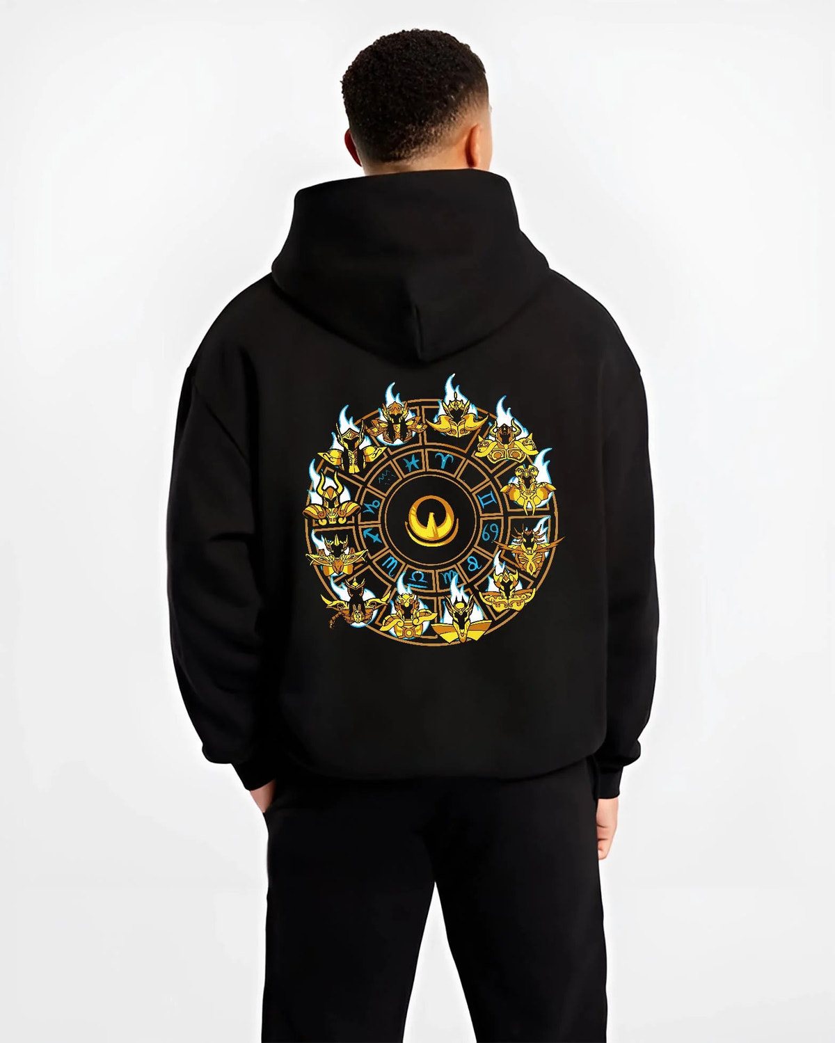 Black hoodie worn by male model from the back featuring Saint Seiya Gold Saints zodiac wheel artwork.