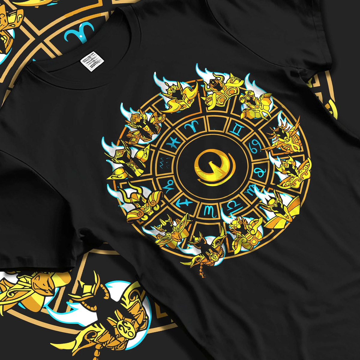 Black T-shirt laid flat with natural folds featuring Saint Seiya Gold Saints zodiac wheel artwork.