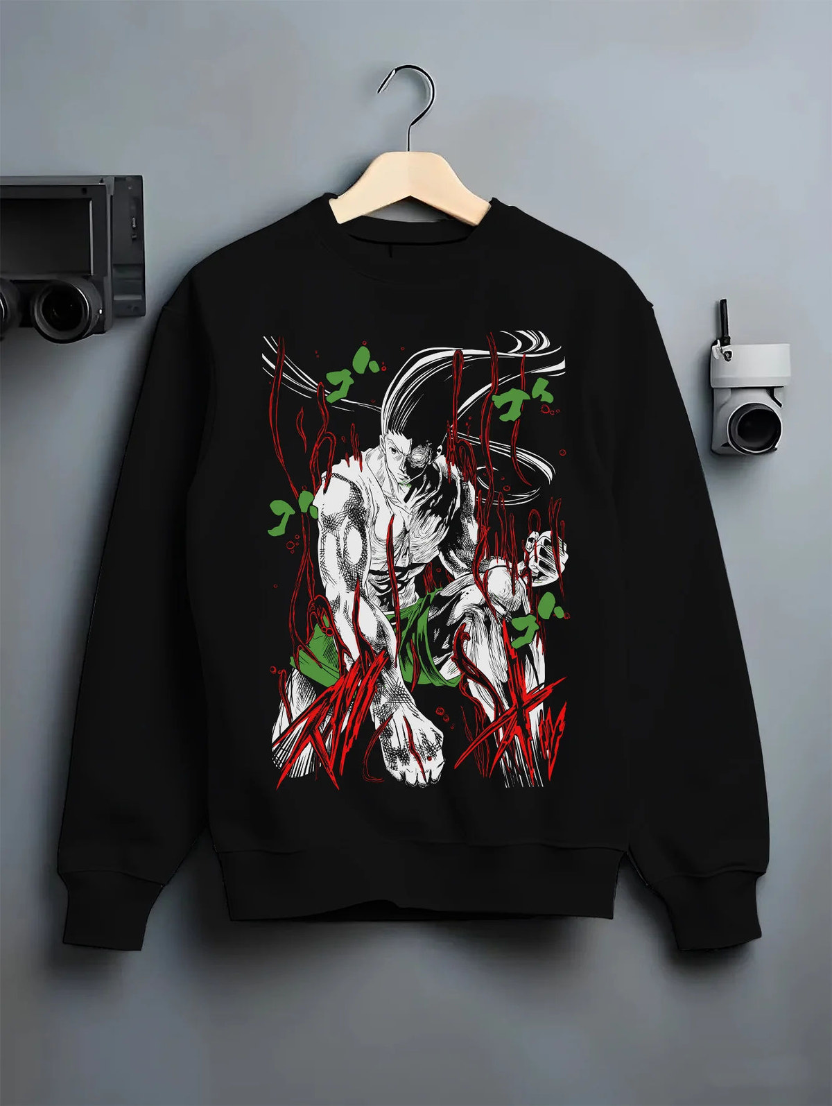 Black crewneck sweatshirt on hanger showing Gon Freecss from Hunter x Hunter: adult transformation dark illustration