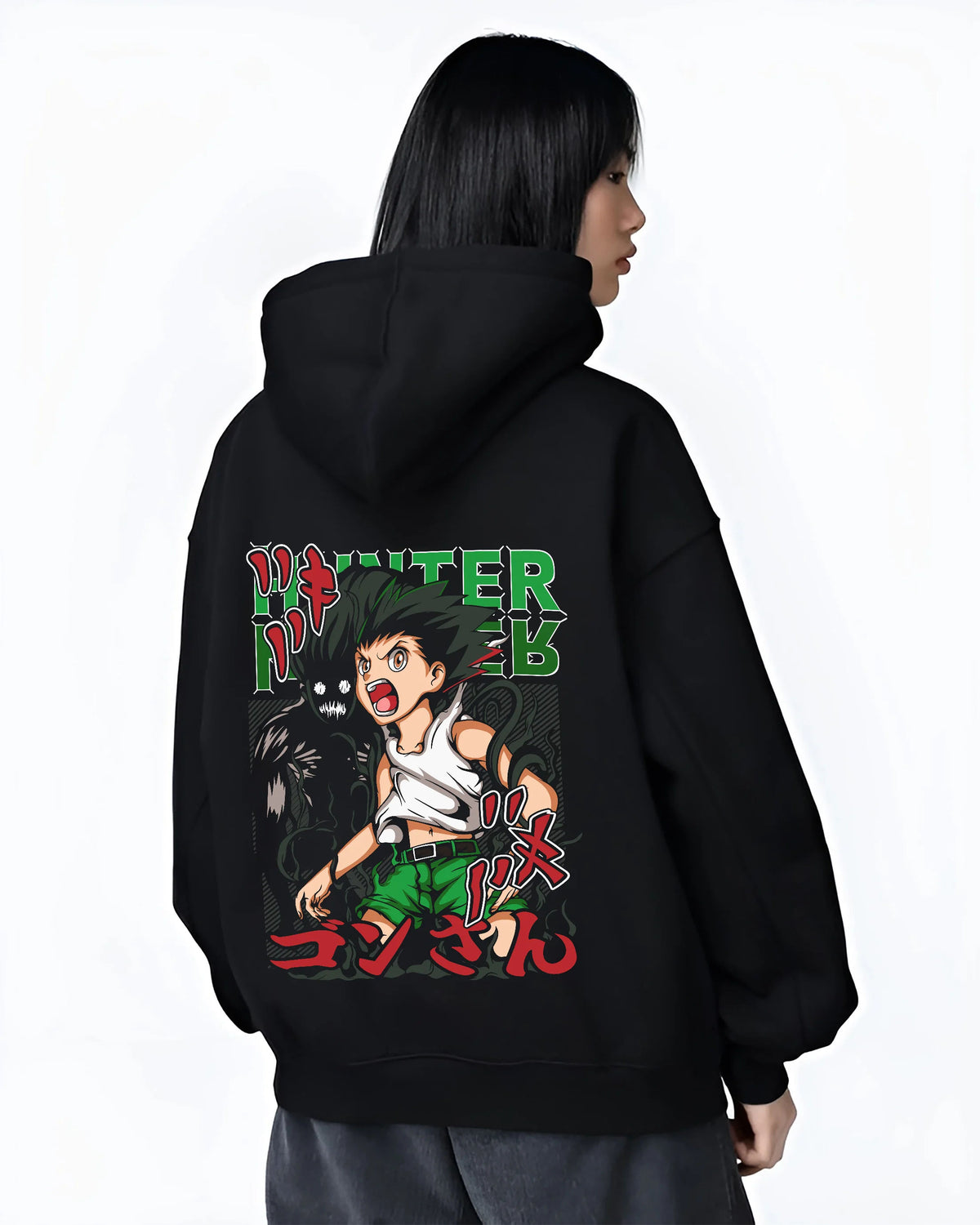 Black hoodie female model back view showing Gon Freecss from Hunter x Hunter: youthful action pose