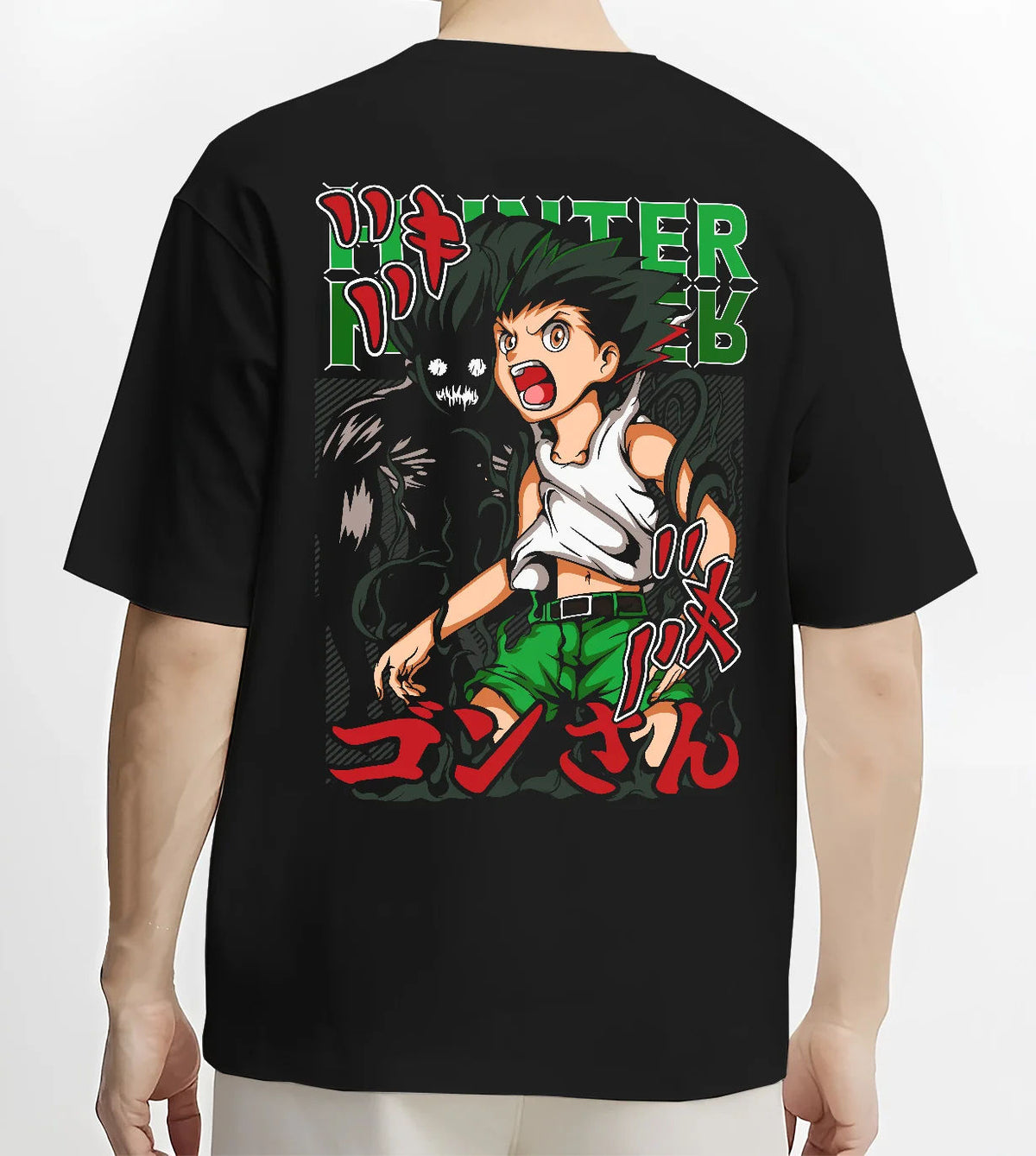 Black T-shirt model back view showing Gon Freecss from Hunter x Hunter: youthful action pose