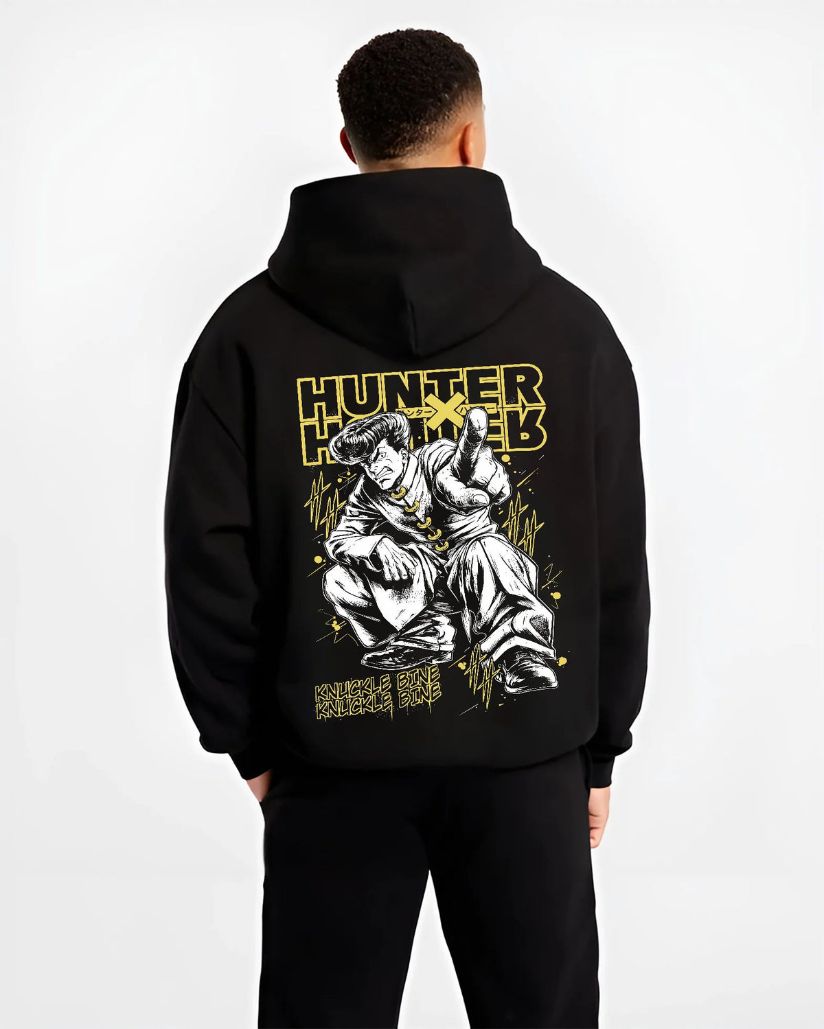 Black hoodie model back view showing Gon Freecss from Hunter x Hunter: adult muscular transformation