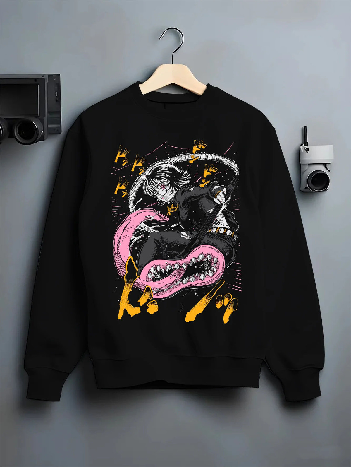 Black crewneck sweatshirt on hanger showing Hunter x Hunter monster and fighter scene: monster/fighter scene ( characters)