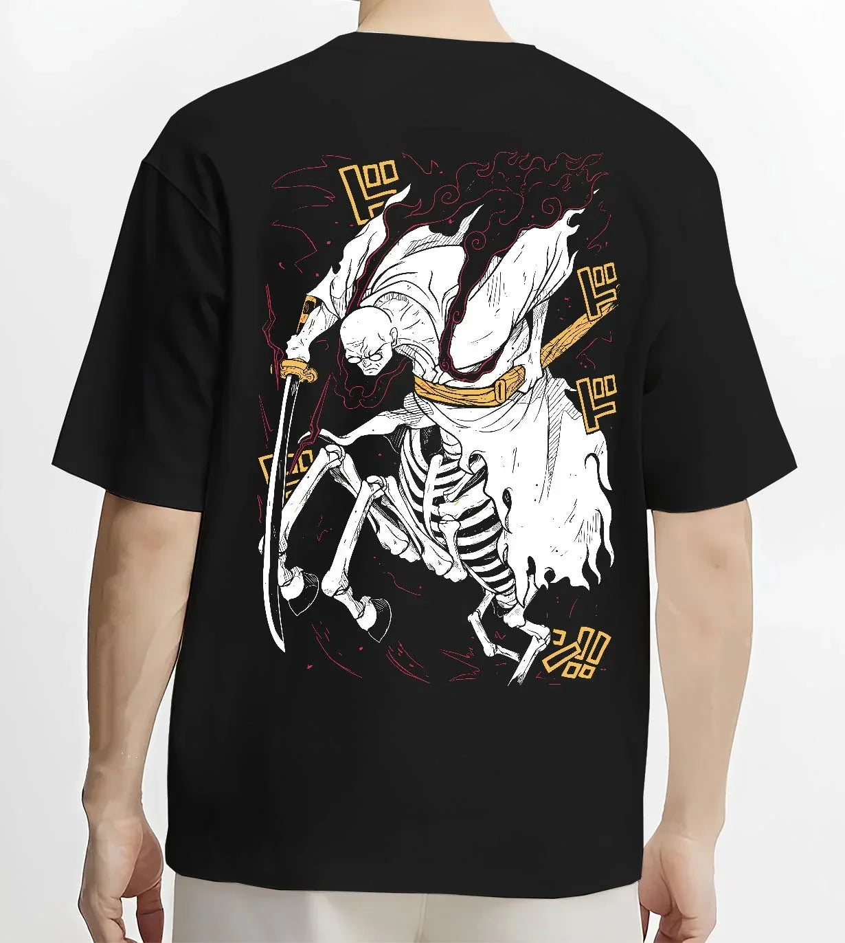 Black T-shirt worn by male model, back view with One Piece Hoodie Brook Soul King Rising Jumper graphic streetwear graphic.