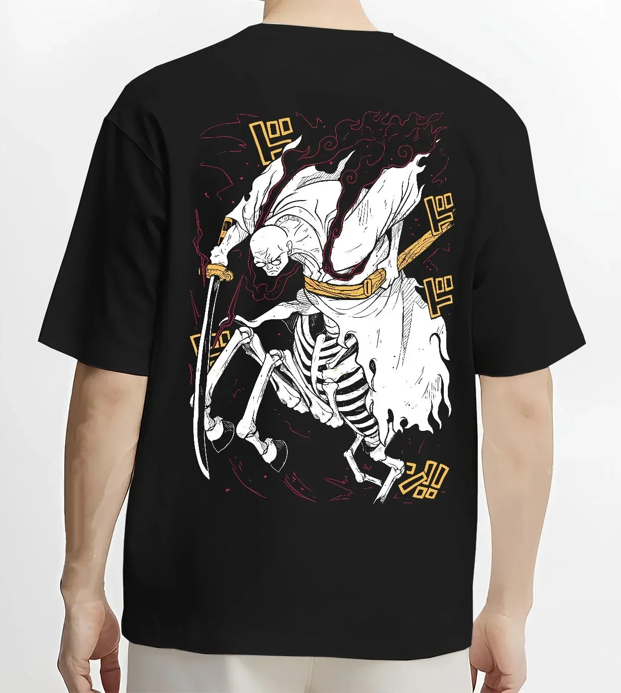 Black T-shirt worn by male model, back view with One Piece Hoodie Brook Soul King Rising Jumper graphic streetwear graphic.
