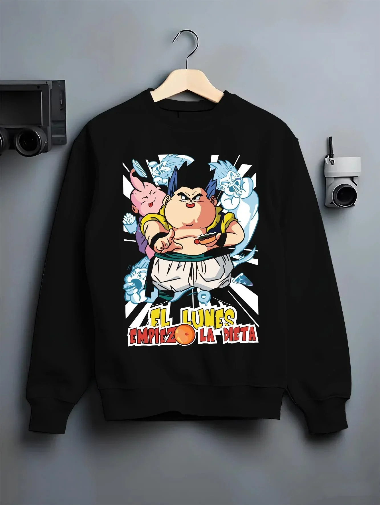 Black crewneck sweatshirt on hanger with Dragon Ball Z Hoodie Gotenks Fusion Power Jumper graphic bold anime graphic.