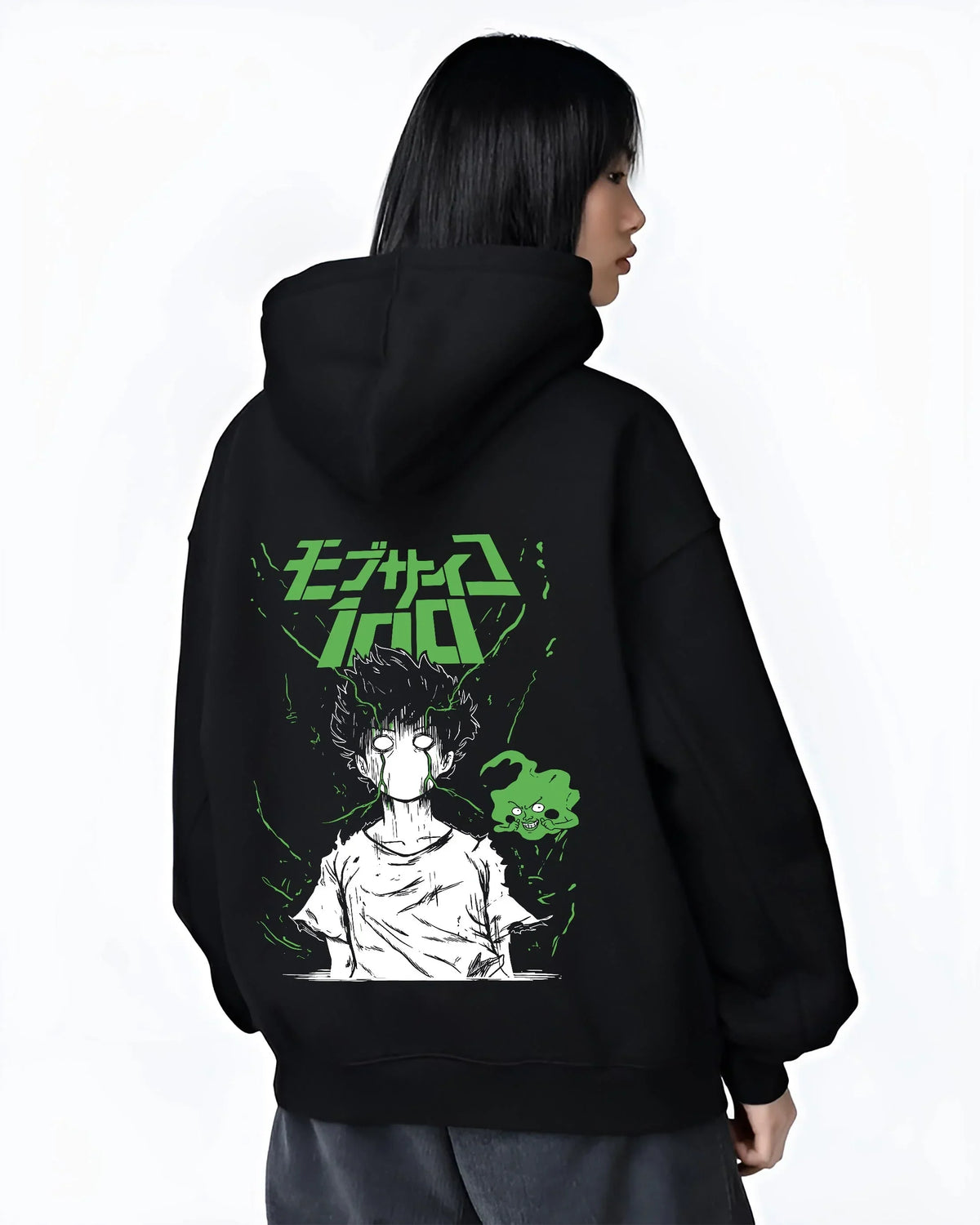Black hoodie worn by female model, back view with Mob Psycho 100 Hoodie Green Esper Spirit Jumper graphic bold anime graphic.