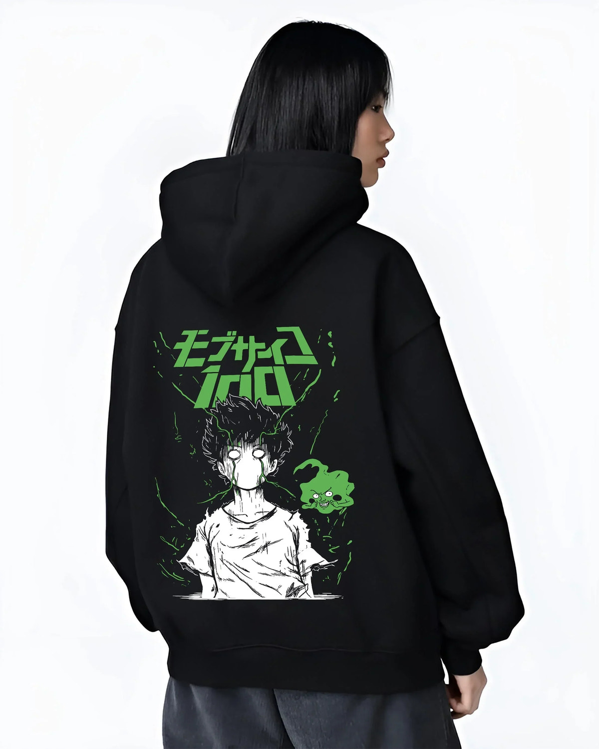 Black hoodie worn by female model, back view with Mob Psycho 100 Hoodie Green Esper Spirit Jumper graphic bold anime graphic.