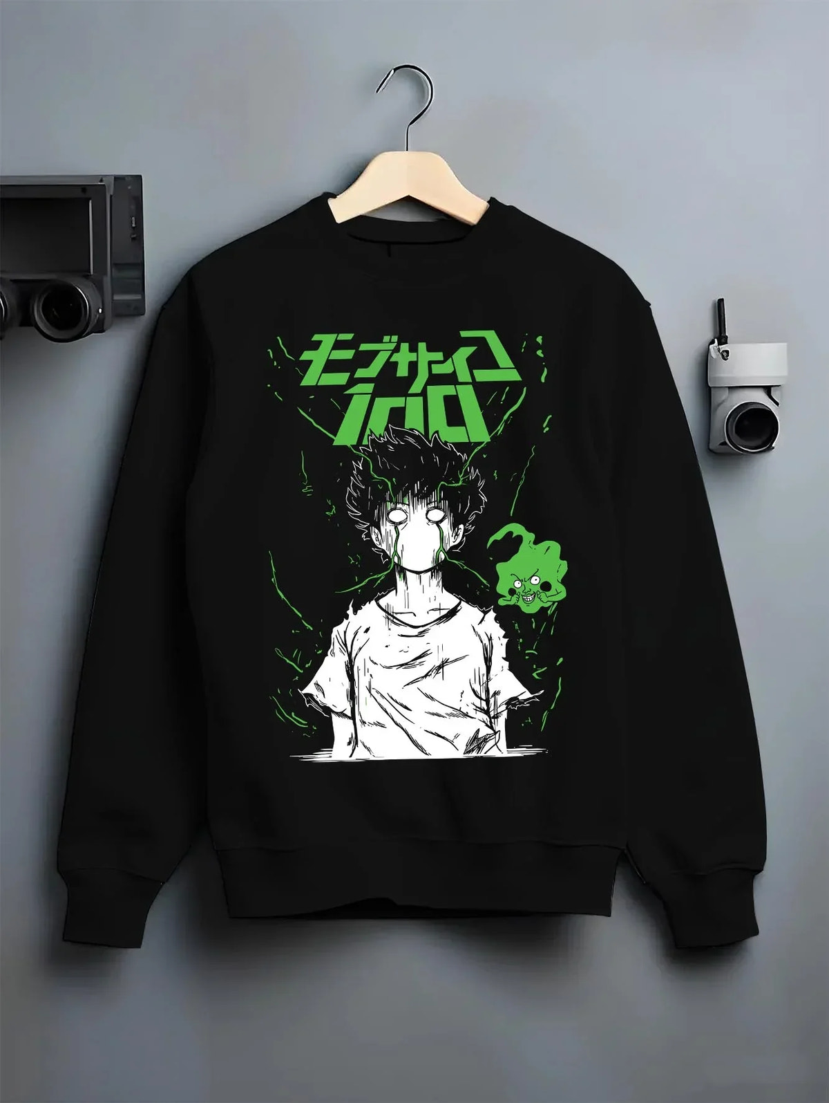 Black crewneck sweatshirt on hanger with Mob Psycho 100 Hoodie Green Esper Spirit Jumper graphic streetwear graphic.