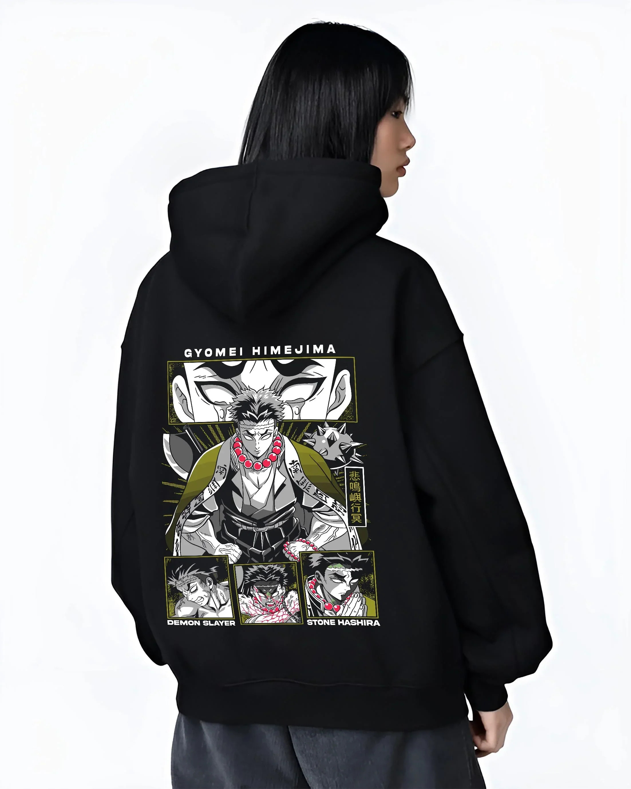 Black hoodie worn by female model, back view with Demon Slayer Hoodie Gyomei Himejima Stone Hashira graphic streetwear graphic.