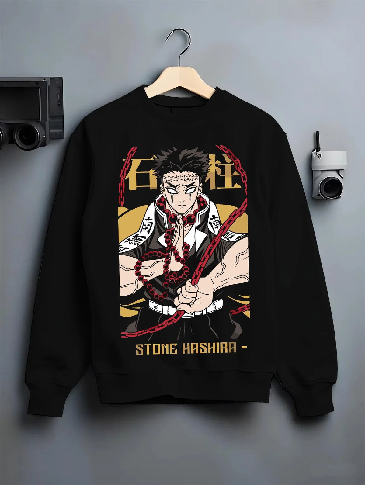 Black crewneck sweatshirt on hanger featuring Gyomei Himejima Stone Hashira prayer artwork.