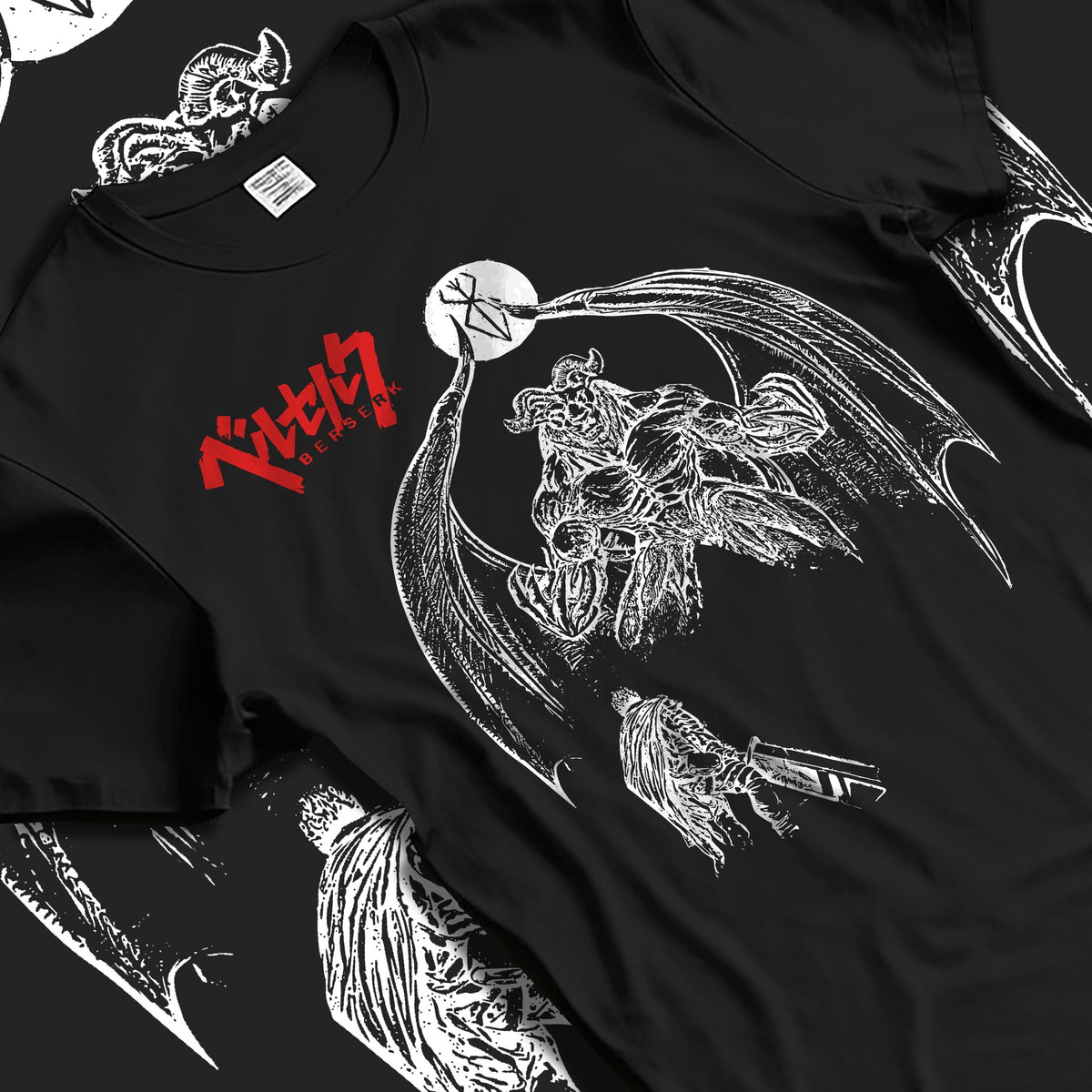 Black T-shirt laid flat with natural fabric folds, featuring Berserk Guts retro manga graphic artwork with apostle demon design in bold dark fantasy style.