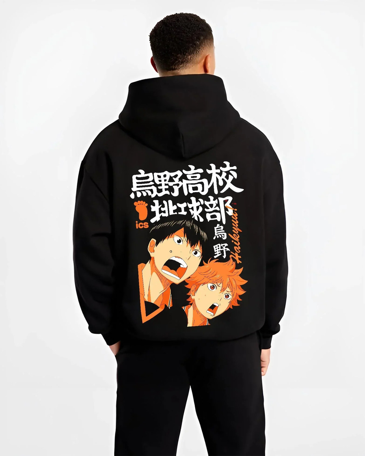 Black hoodie worn by male model, back view with Haikyuu Hoodie Shoyo Hinata Karasuno Jump Jumper graphic bold anime graphic.