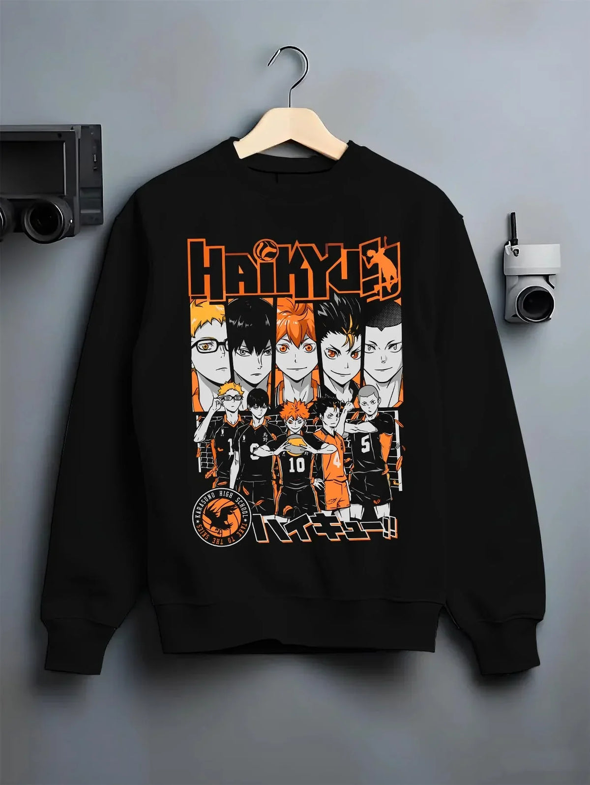 Black crewneck sweatshirt on hanger with Haikyuu Hoodie Shoyo Hinata Match Intense Jumper graphic premium wear.
