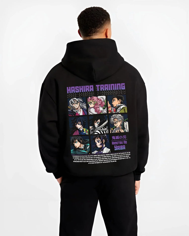 Black hoodie worn by male model, back view with Demon Slayer Hoodie Hashira Training Corps Poster graphic bold anime graphic.