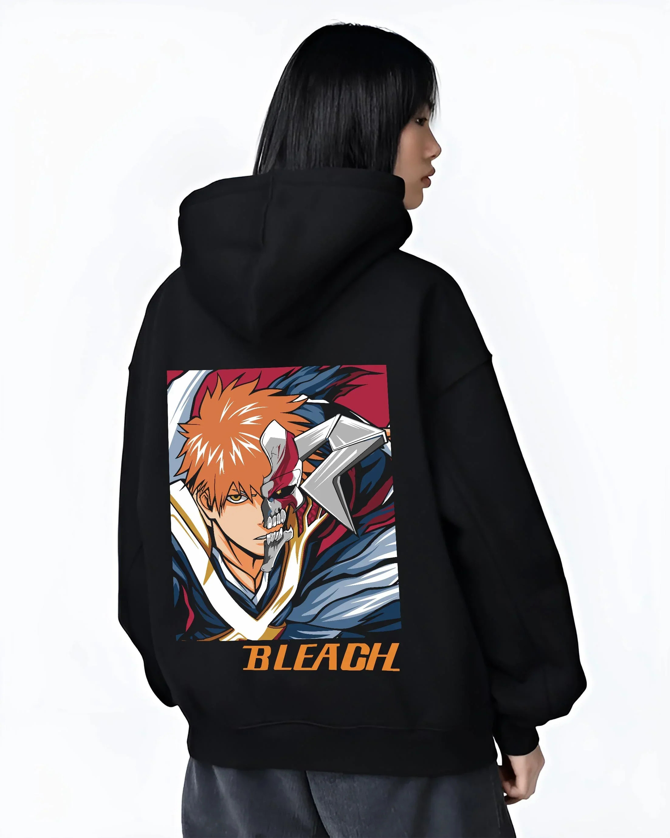 Black hoodie worn by female model, back view with Bleach Hoodie Hollow Ichigo Masked Vizard Form graphic streetwear graphic.
