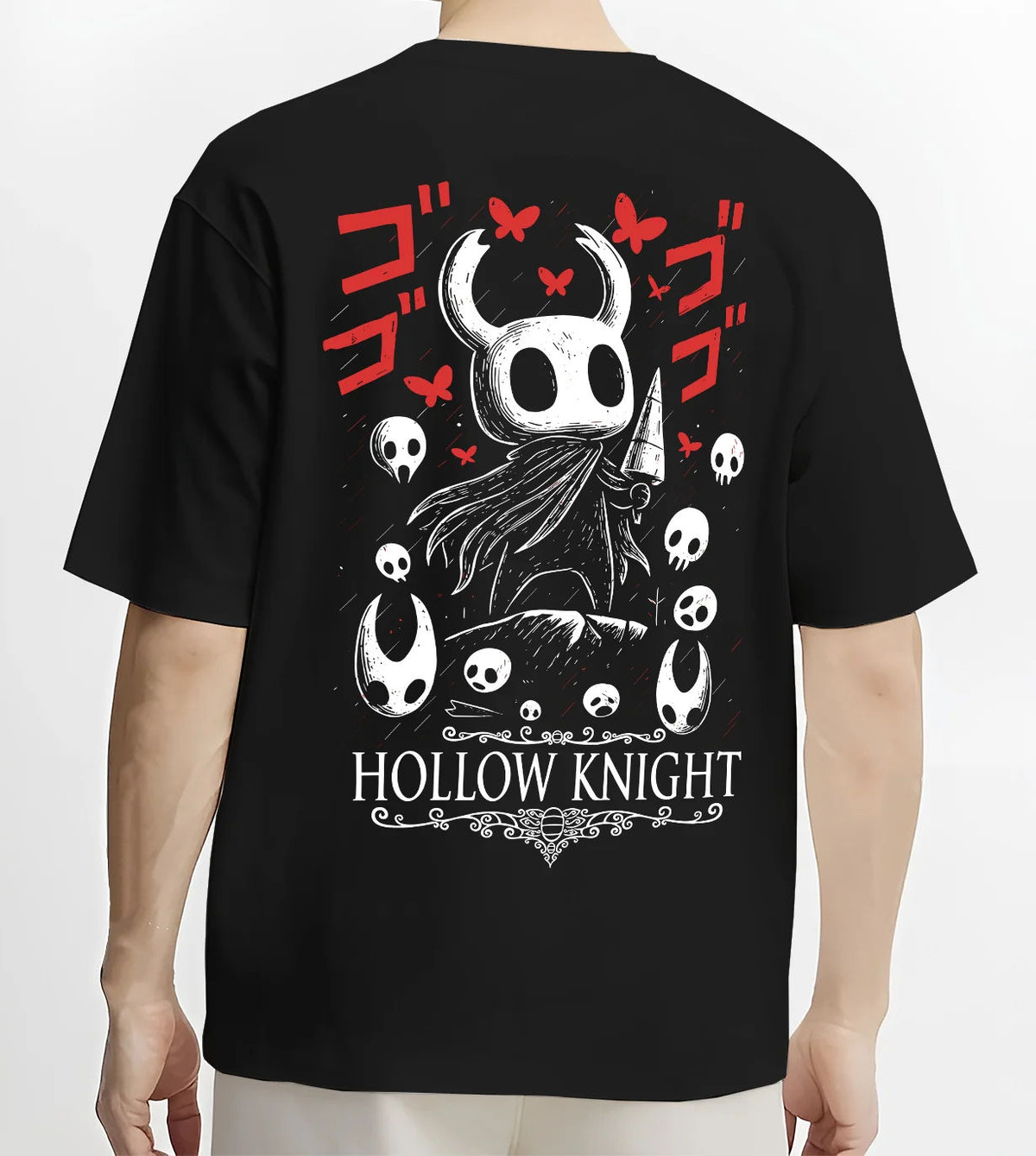 Black T-shirt model back view showing Hollow Knight: black-and-white knight heads