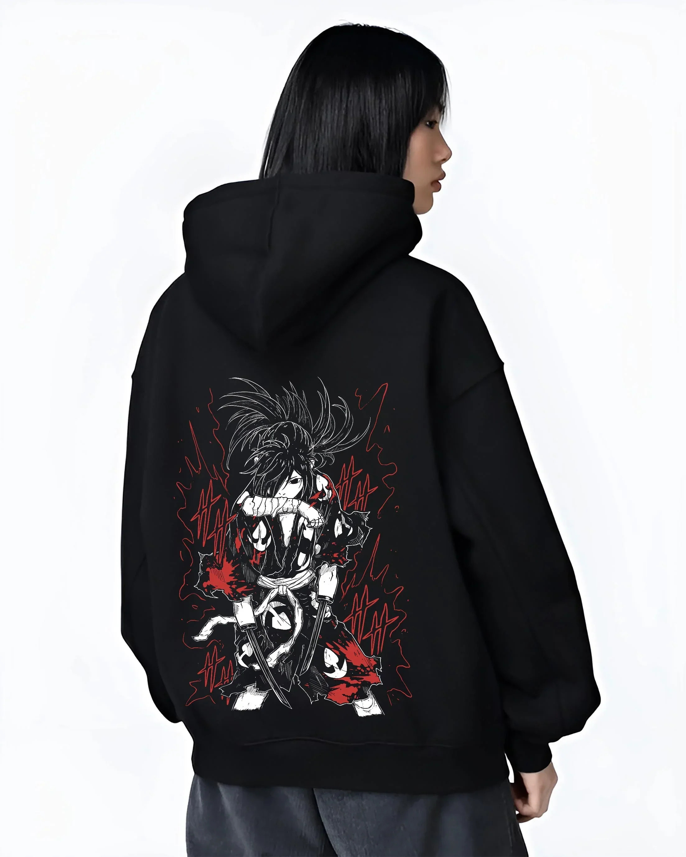 Black hoodie worn by female model, back view with Dororo Hoodie Hyakkimaru Sword Fighter Jumper graphic bold anime graphic.
