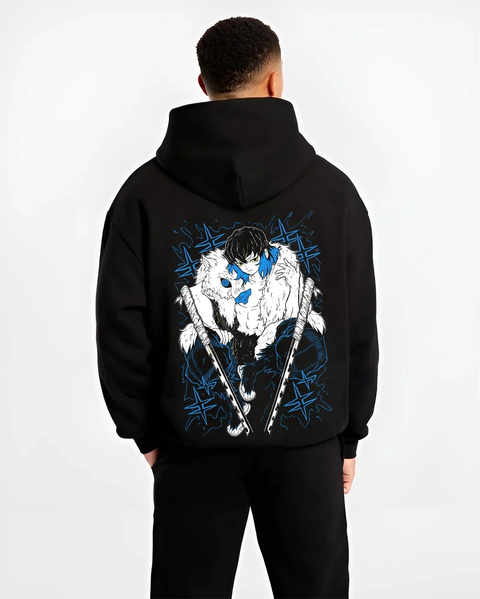 Black hoodie worn by male model, back view with Demon Slayer Hoodie Inosuke Hashibira Dynamic Jumper graphic streetwear graphic.