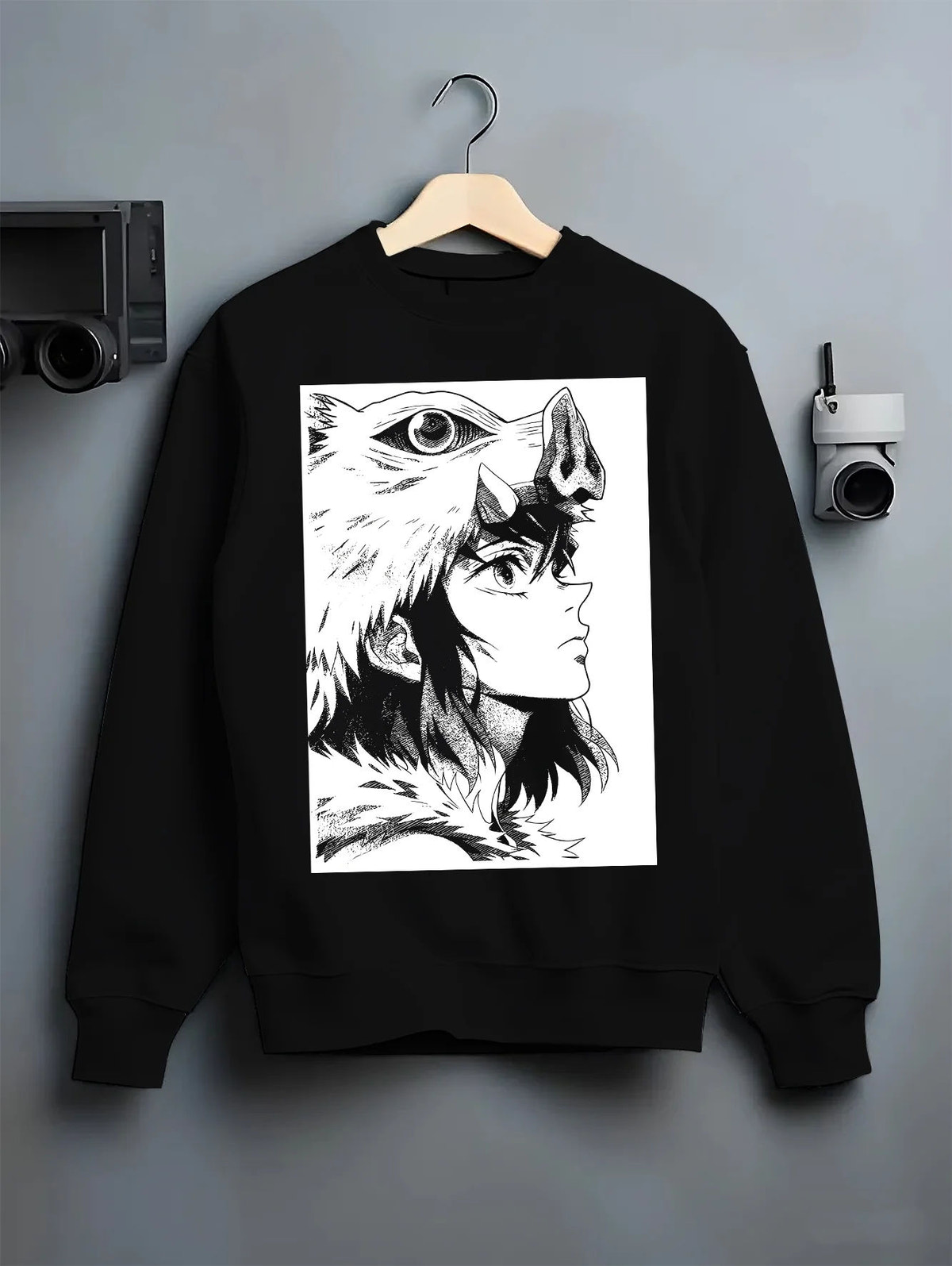 Black crewneck sweatshirt on hanger showing Inosuke Hashibira from Demon Slayer: monochrome side profile
