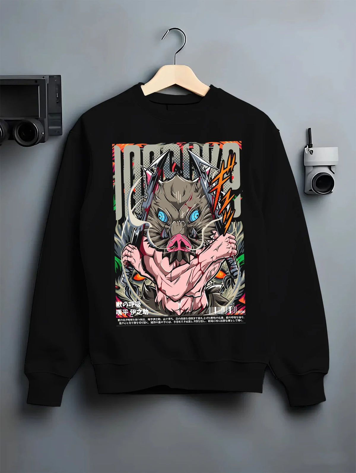 Black crewneck sweatshirt on hanger showing Inosuke Hashibira from Demon Slayer: blue-eyed boar mask