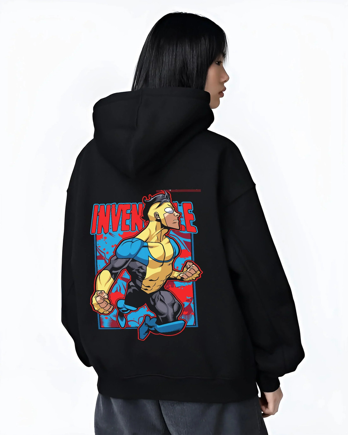 Black hoodie worn by female model, back view with Invincible Hoodie Mark Grayson Flying Hero Jumper graphic streetwear graphic.