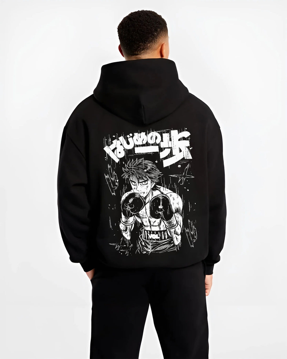 Black hoodie model back view showing Ippo Makunouchi from Hajime no Ippo: boxing stance monochrome illustration