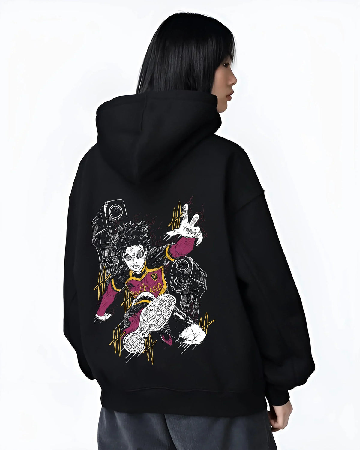 Black hoodie worn by female model, back view with Isagi Hoodie Blue Lock Striker Football Forward Play graphic streetwear graphic.