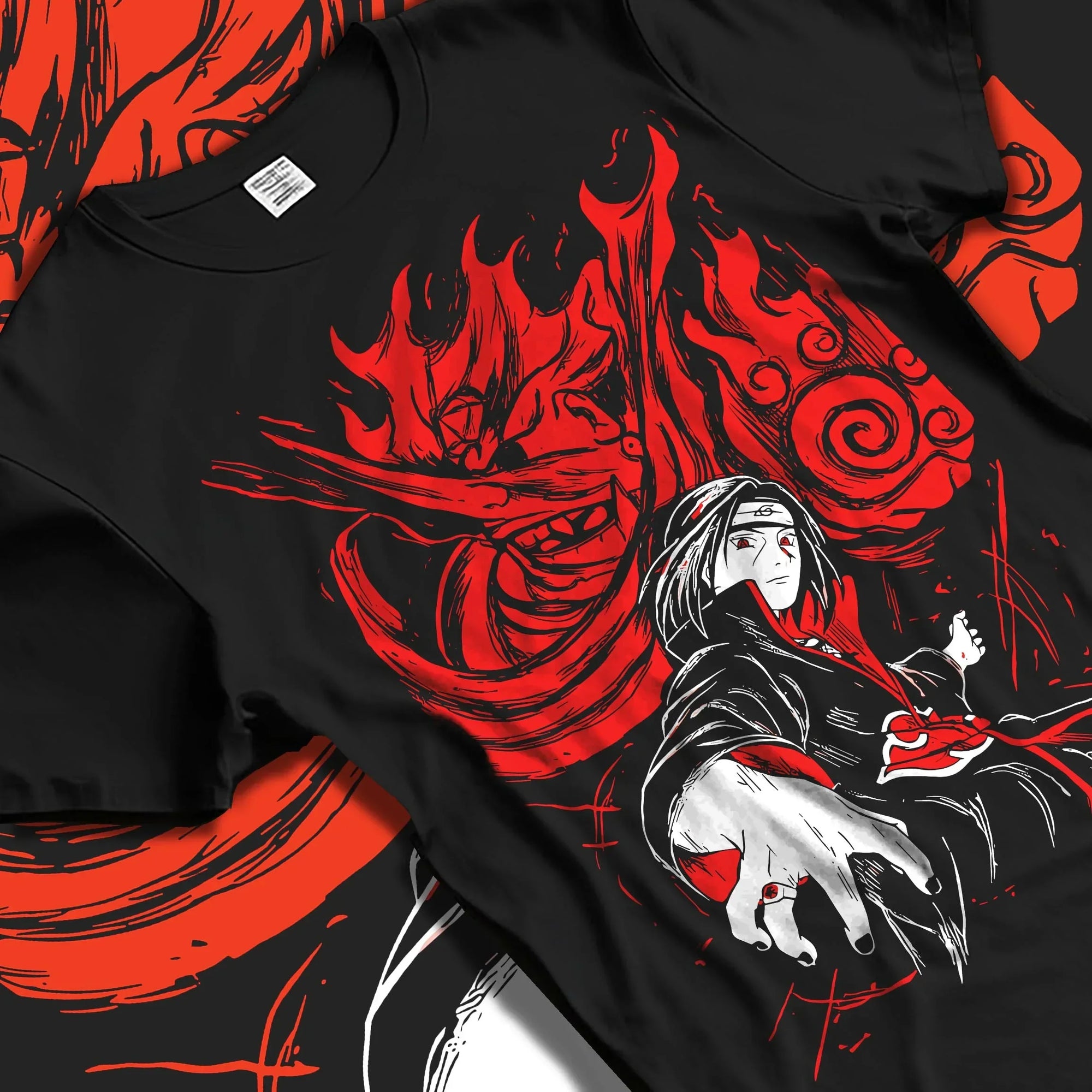 Black T-shirt laid flat with natural folds with Naruto Hoodie Itachi Uchiha Sharingan Power Jumper graphic streetwear graphic.