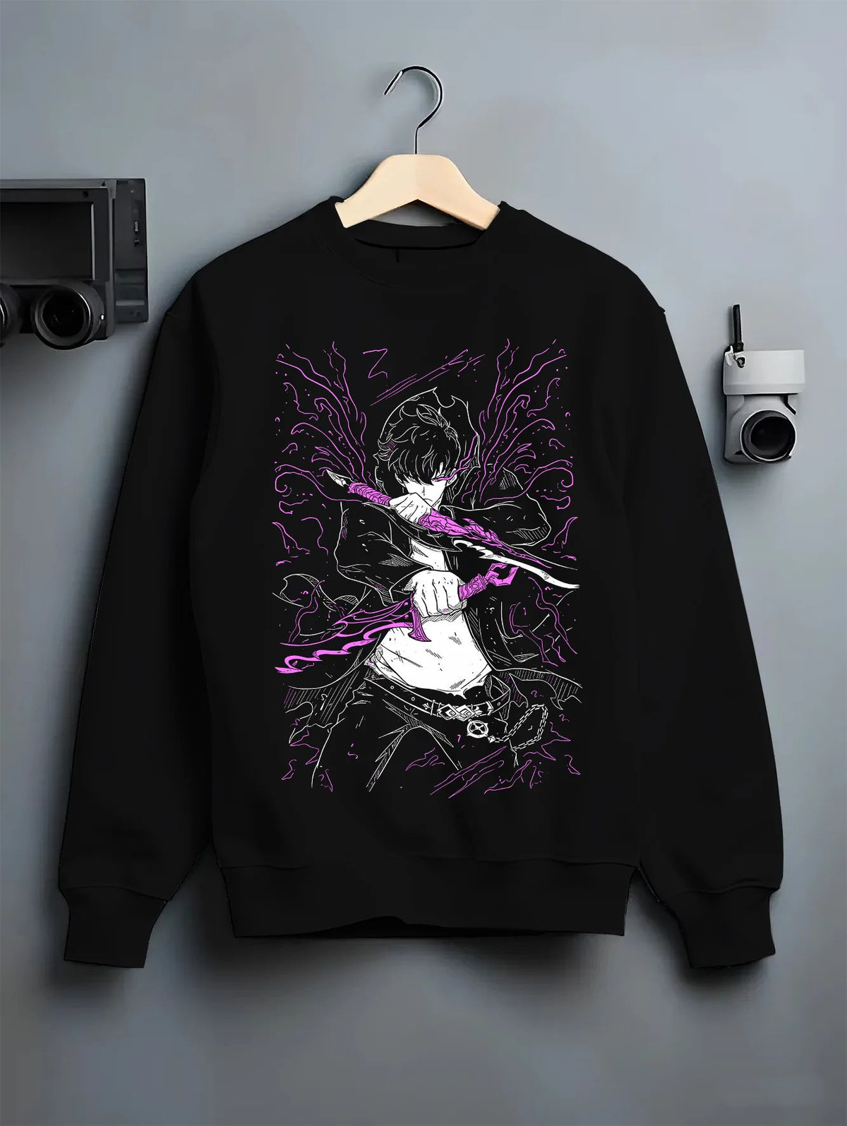 Black crewneck sweatshirt on hanger showing Sung Jin-Woo from Solo Leveling: purple blade energy action