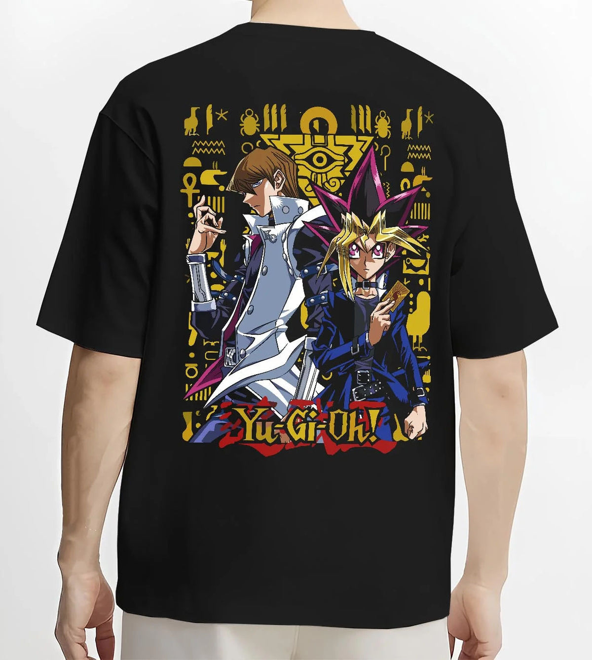 Black T-shirt worn by male model from the back featuring Yugi and Kaiba duel rivals artwork.
