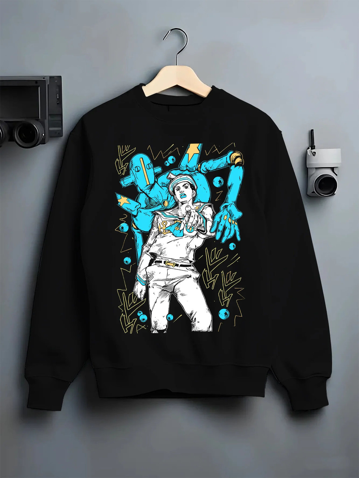 Black crewneck sweatshirt on hanger with Josuke Higashikata (Part 8 / Gappy) and Soft & Wet from JoJo’s Bizarre Adventure