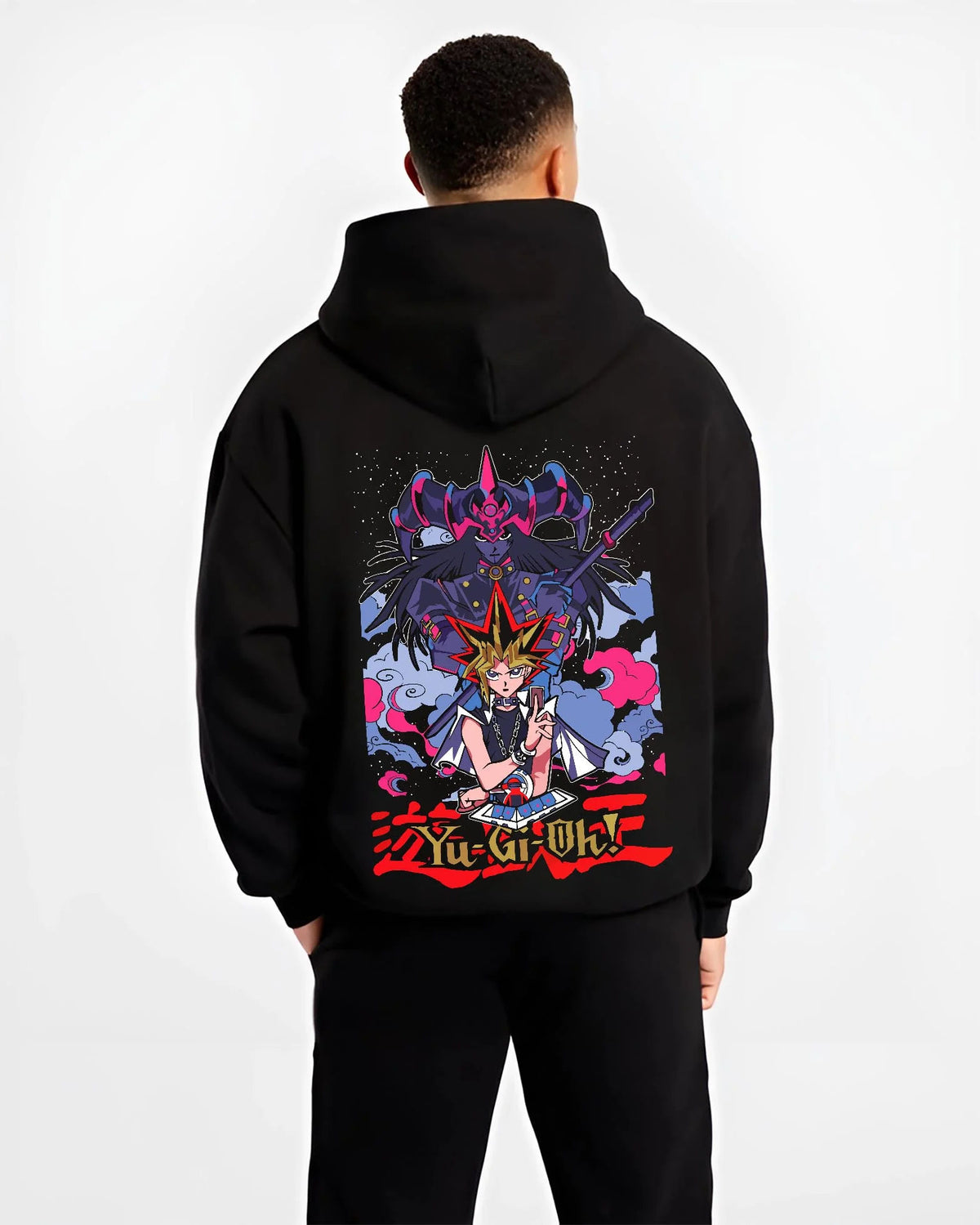 Black hoodie worn by male model from the back featuring Seto Kaiba Ultimate Dragon duel monster artwork.