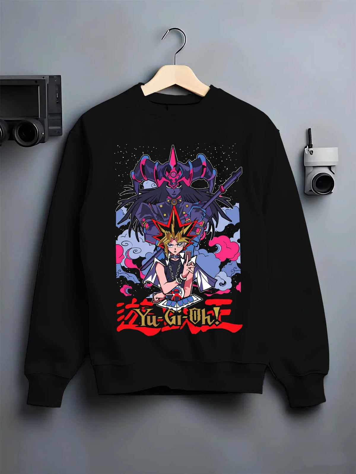 Black crewneck sweatshirt on hanger featuring Seto Kaiba Ultimate Dragon duel monster artwork.