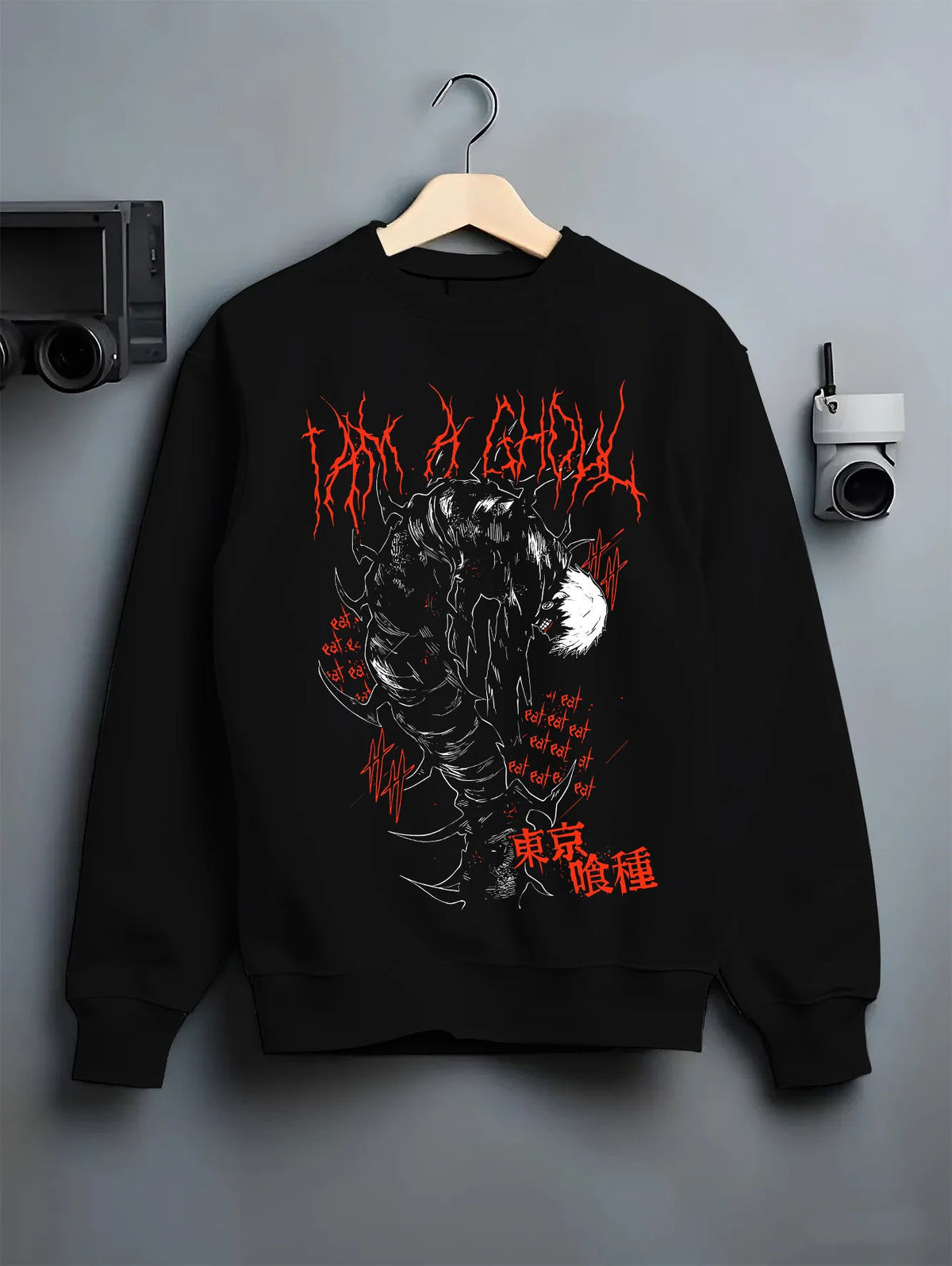 Black crewneck sweatshirt on hanger showing Kaneki from Tokyo Ghoul: one-eyed ghoul black body and red art
