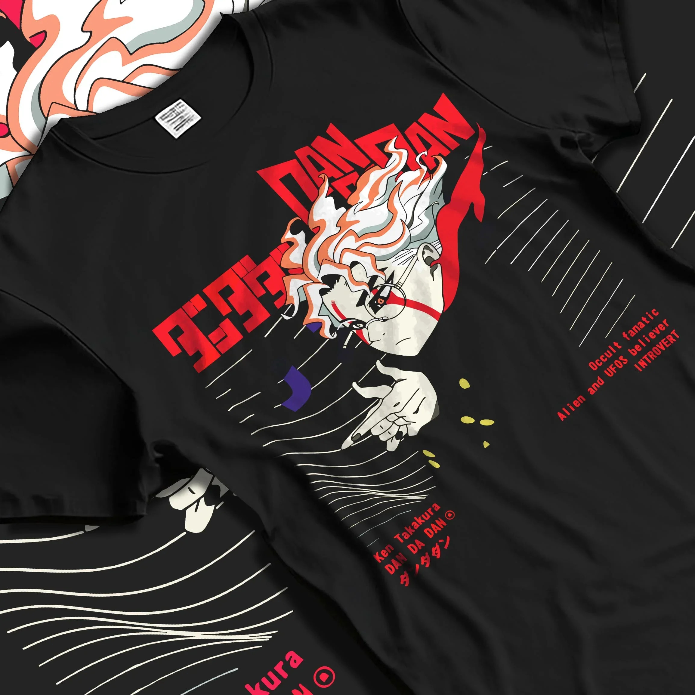 Black T-shirt laid flat with natural folds with Ken Takakura Dandadan Hoodie Occult UFO Believer Retro graphic premium wear.
