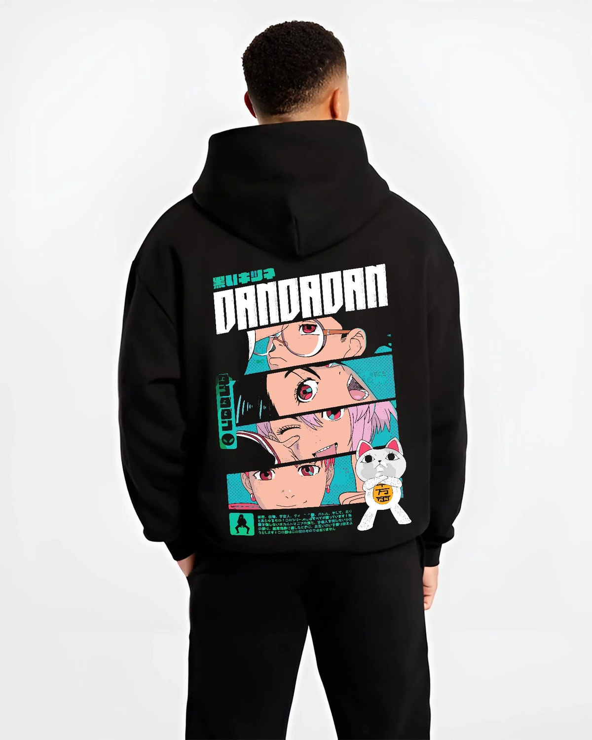 Black hoodie model back view showing Dandadan ensemble: Okarun, Momo, Aira, Jiji and Turbo Granny (cat)
