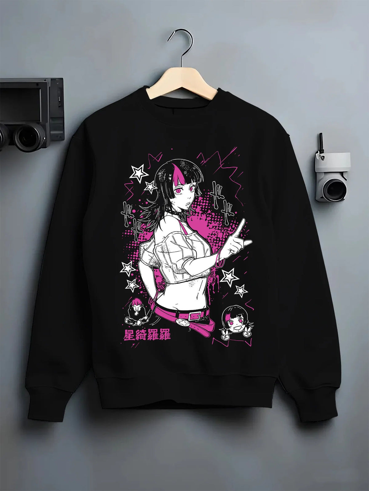 Black crewneck sweatshirt on hanger with Kirara Hoshi with star motif from Jujutsu Kaisen illustrated back graphic