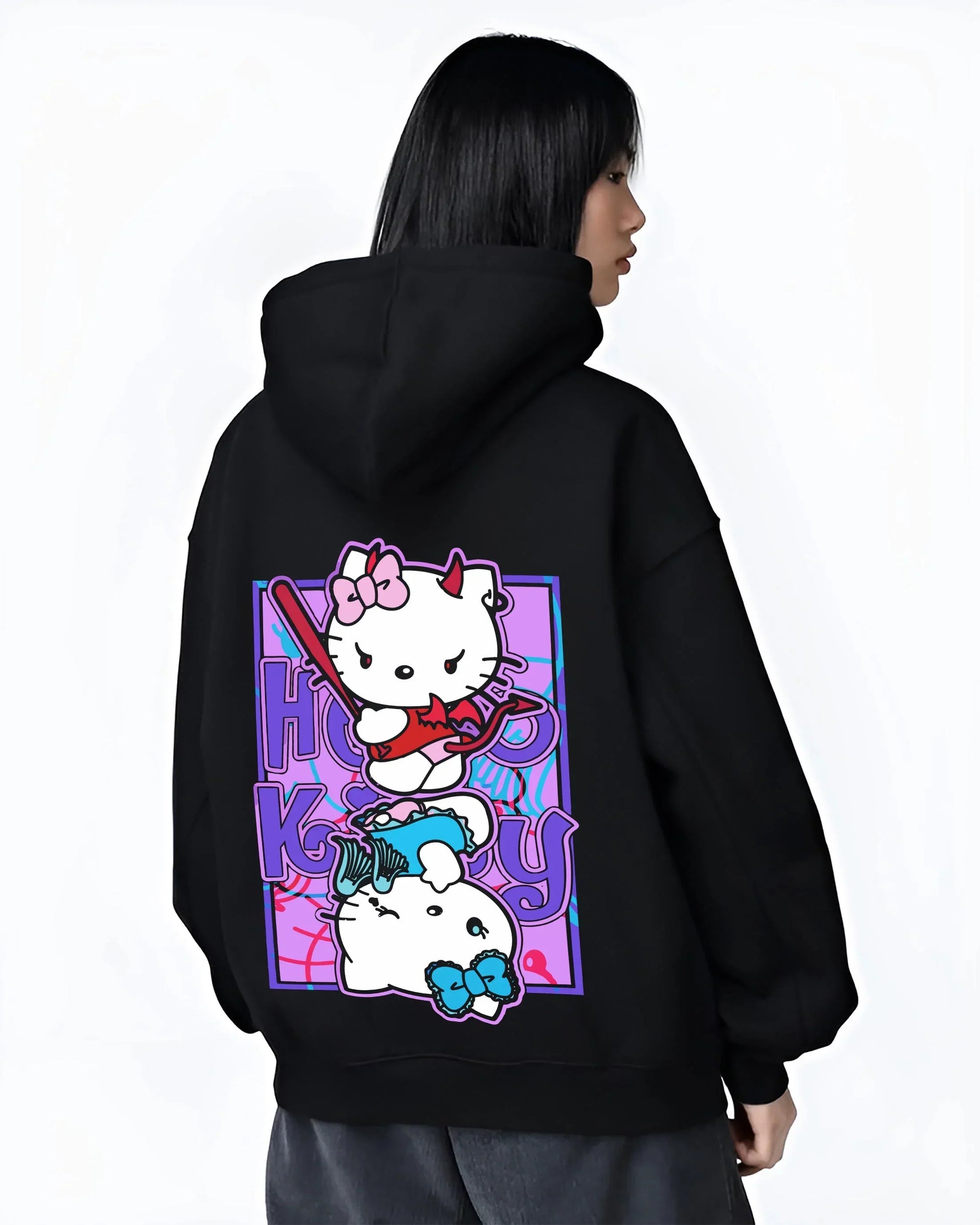 Black hoodie worn by female model, back view with Hello Kitty Hoodie Anime Inspired Cute Crossover Purple graphic streetwear graphic.