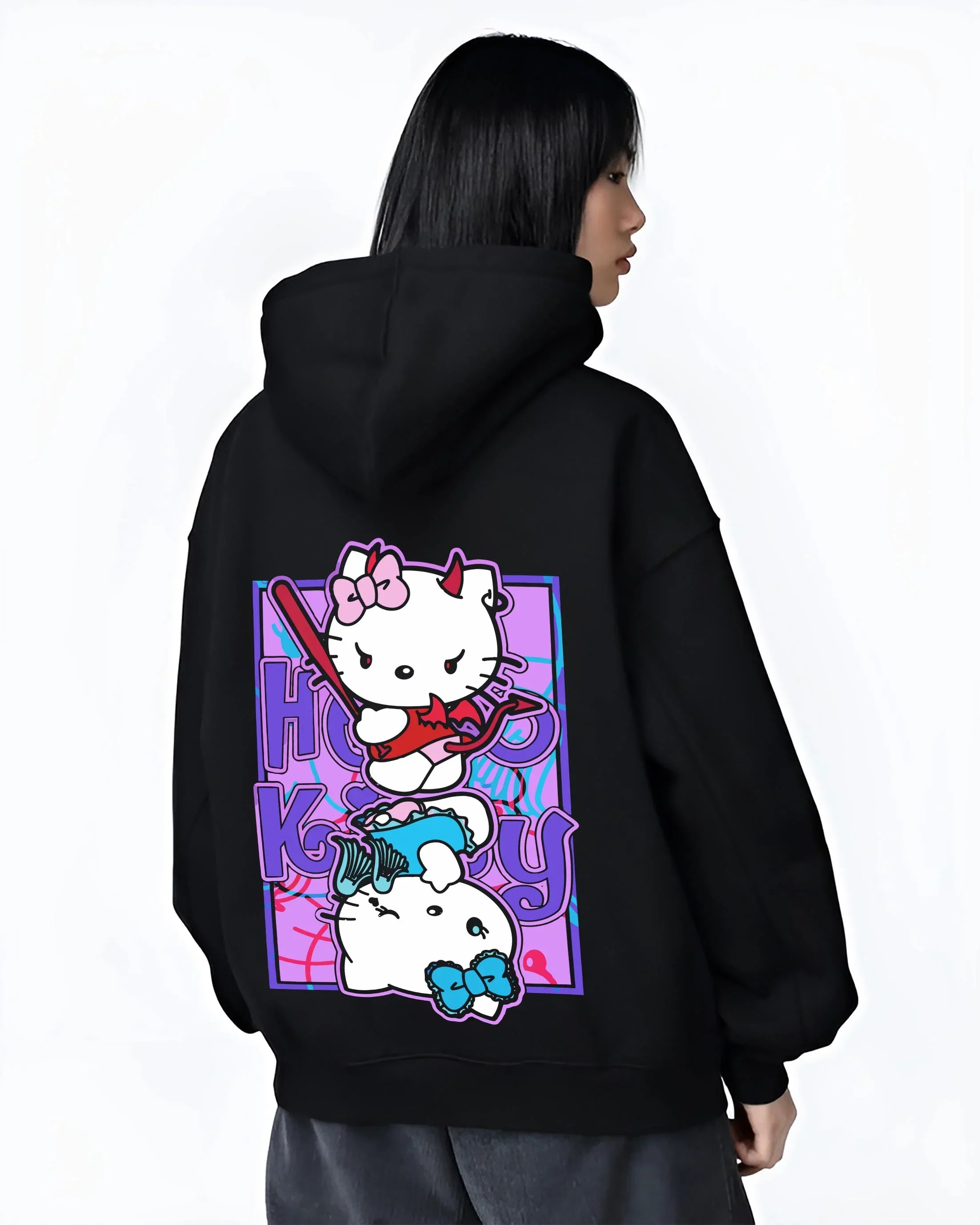 Black hoodie worn by female model, back view with Hello Kitty Hoodie Anime Inspired Cute Crossover Purple graphic streetwear graphic.