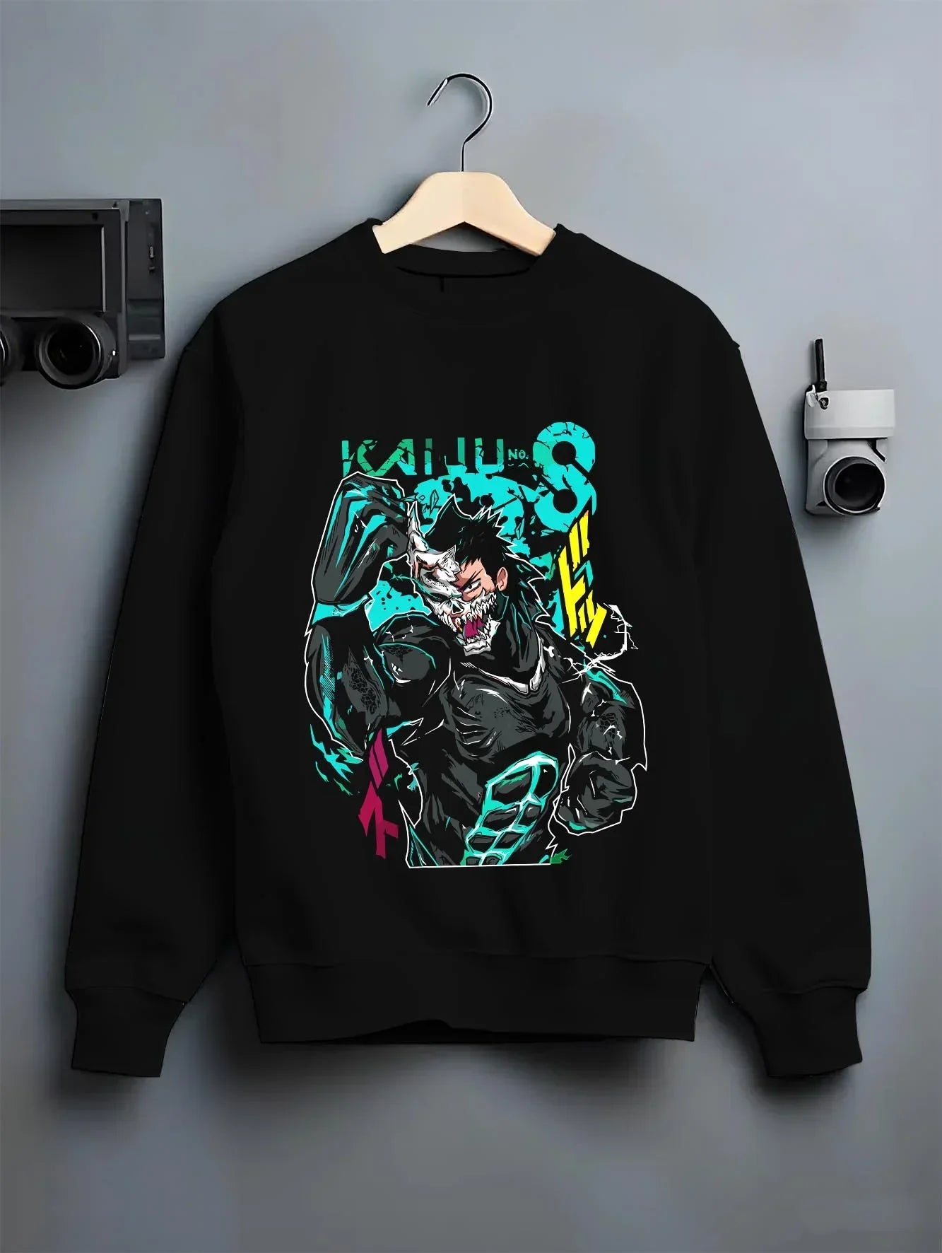 Black crewneck sweatshirt on hanger with Kaiju No. 8 Hoodie Kafka Hibino Beast Awakening graphic streetwear graphic.
