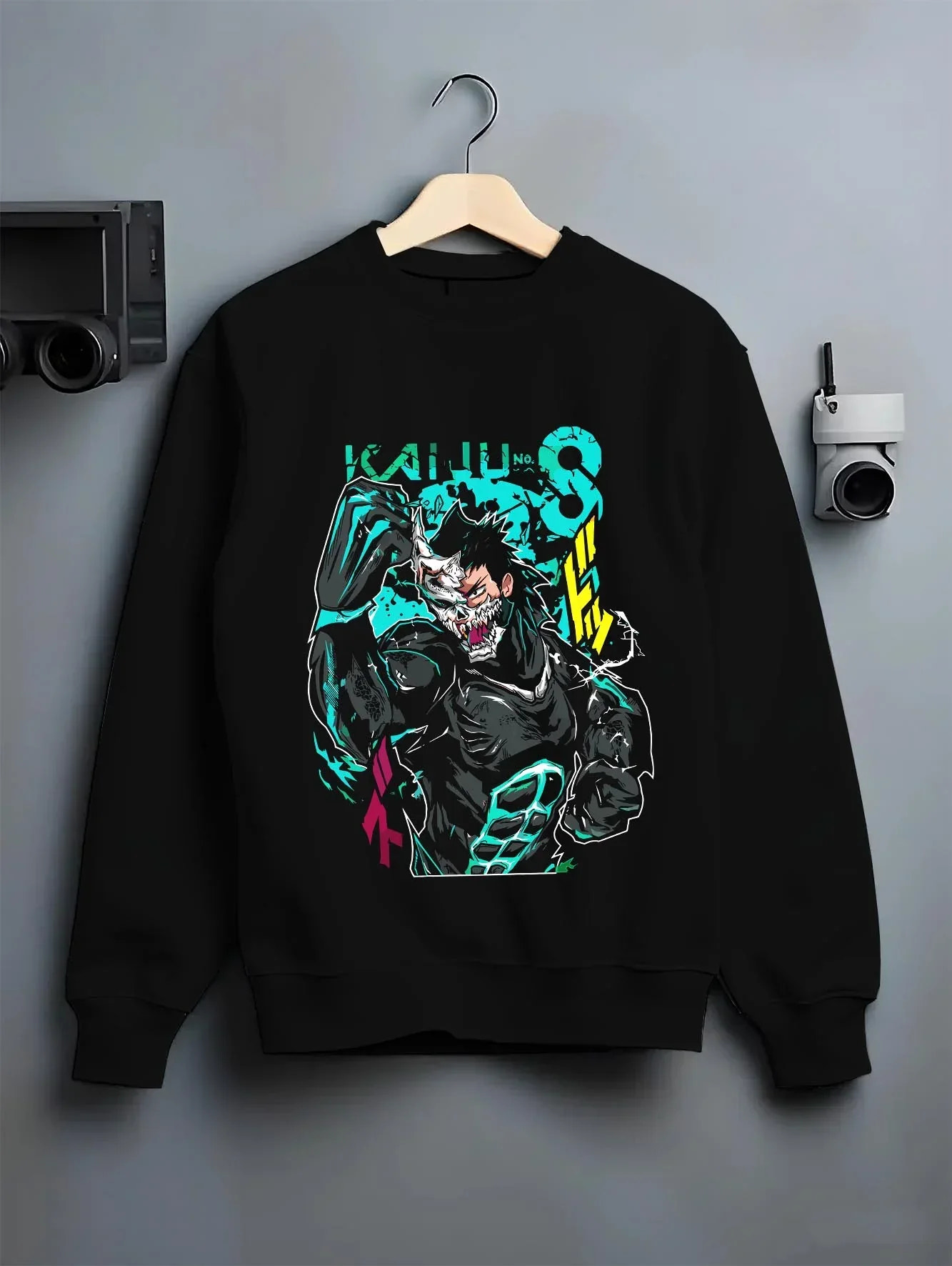 Black crewneck sweatshirt on hanger with Kaiju No. 8 Hoodie Kafka Hibino Beast Awakening graphic streetwear graphic.
