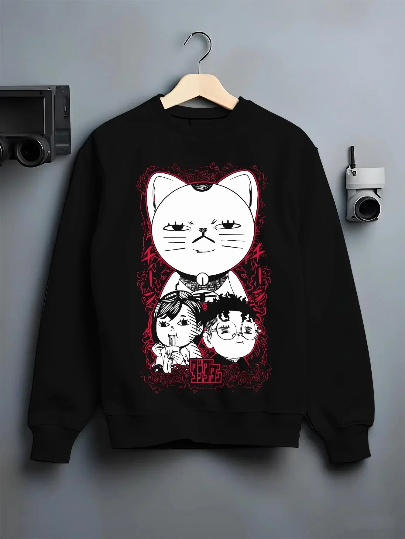 Black crewneck sweatshirt on hanger with Dandadan Turbo Granny Hoodie Lucky Cat Anime Jumper graphic streetwear graphic.