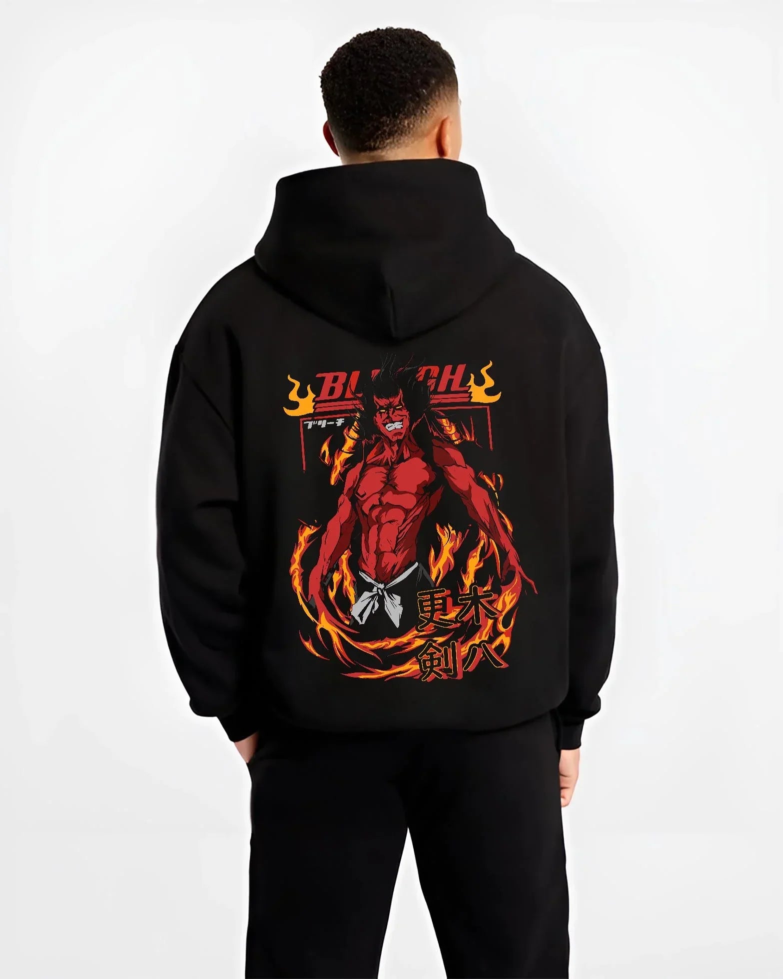 Black hoodie worn by male model, back view with Kenpachi Zaraki Hoodie Bleach Anime Captain Retro graphic premium wear.