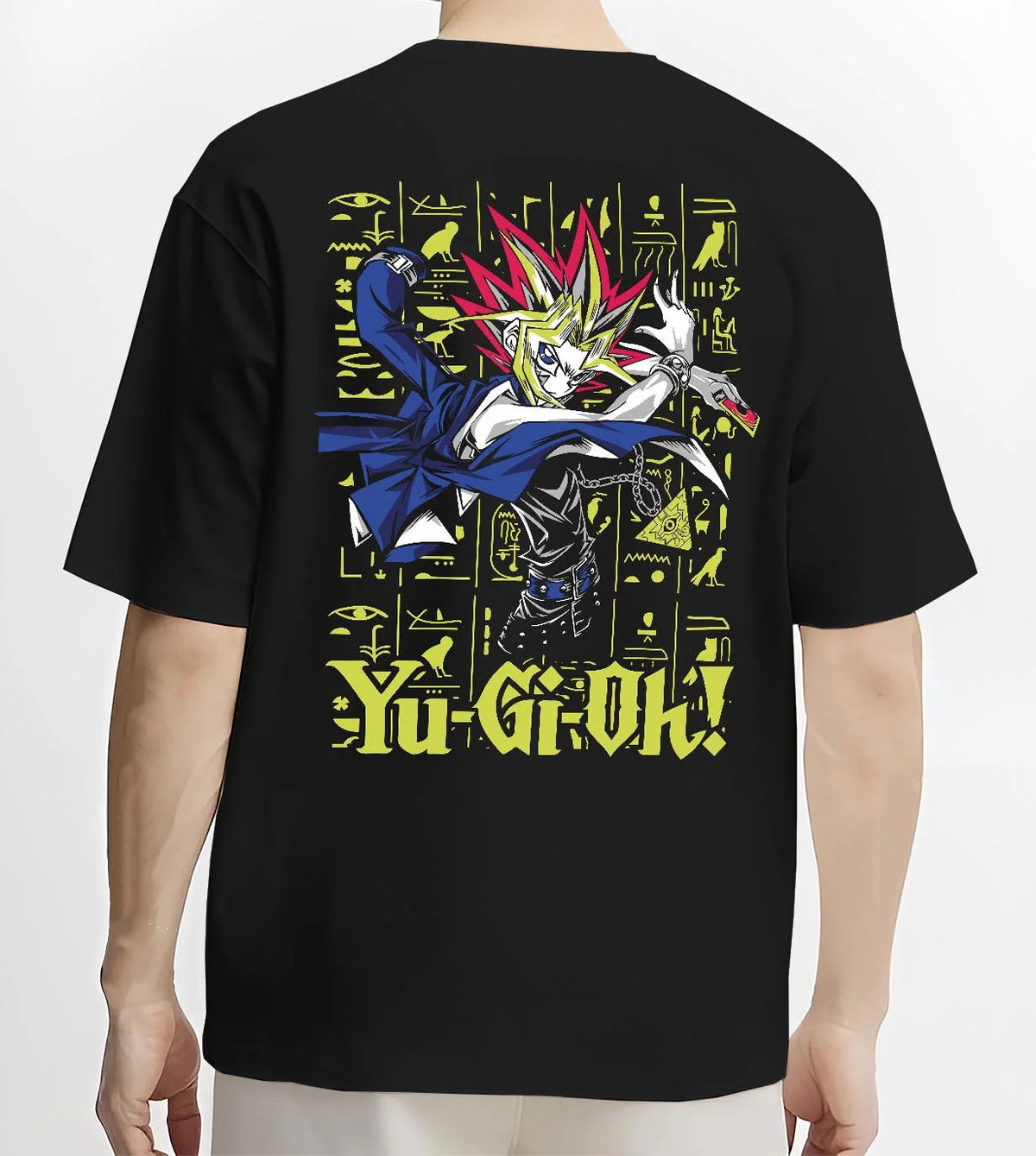 Black T-shirt worn by male model from the back featuring Yugi King of Games Millennium Puzzle artwork.
