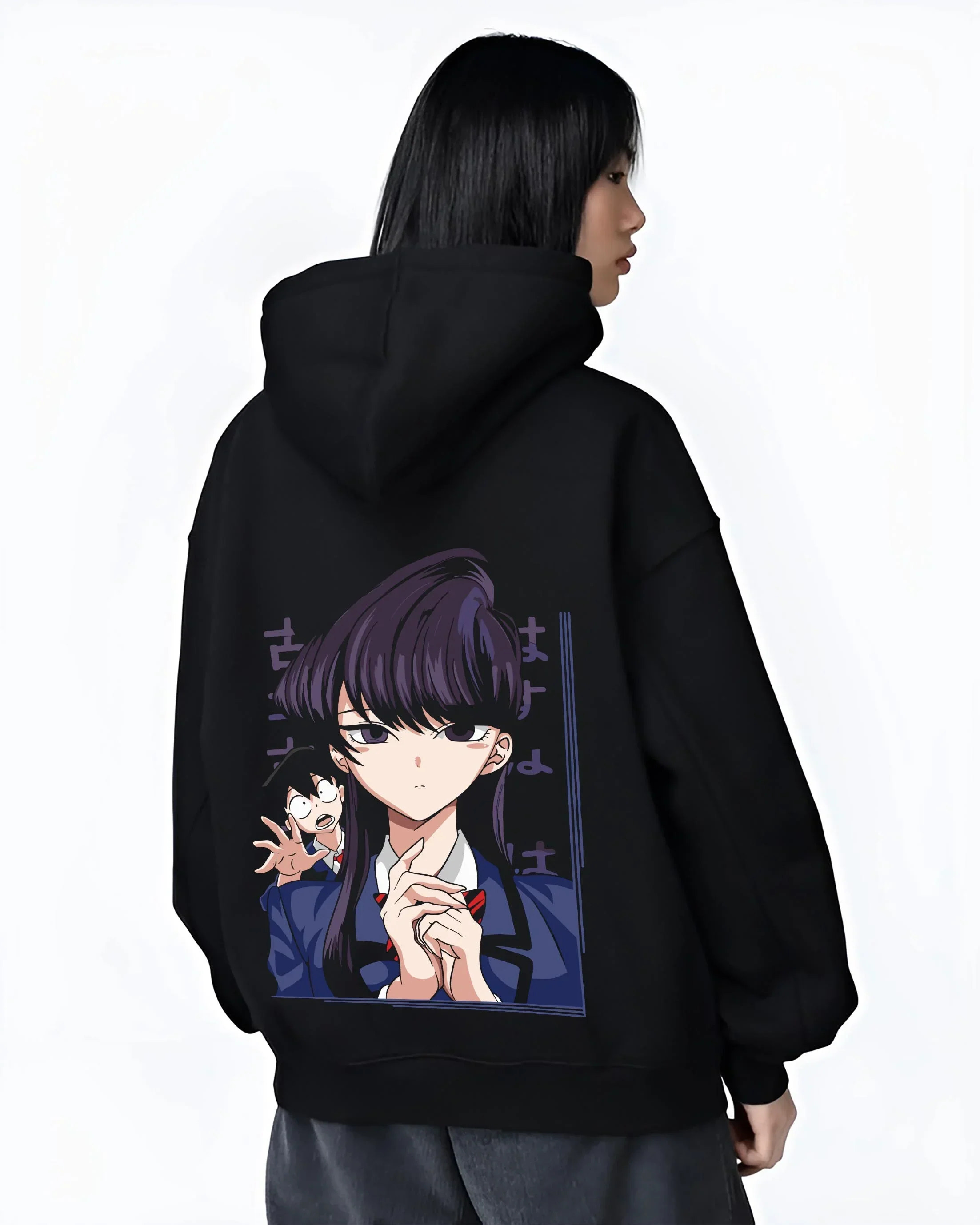Black hoodie worn by female model, back view with Komi Can’t Communicate Hoodie Shouko Komi School Uniform graphic streetwear graphic.